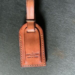 LV luggage tag.